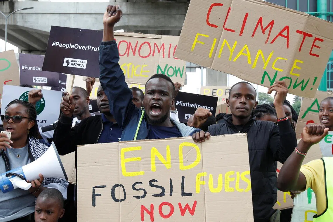 FILE PHOTO: Climate activists participate in a protest demanding economic and climate liberation in Nairobi Kenya, May 25, 2024. REUTERS/Monicah Mwangi/File Photo