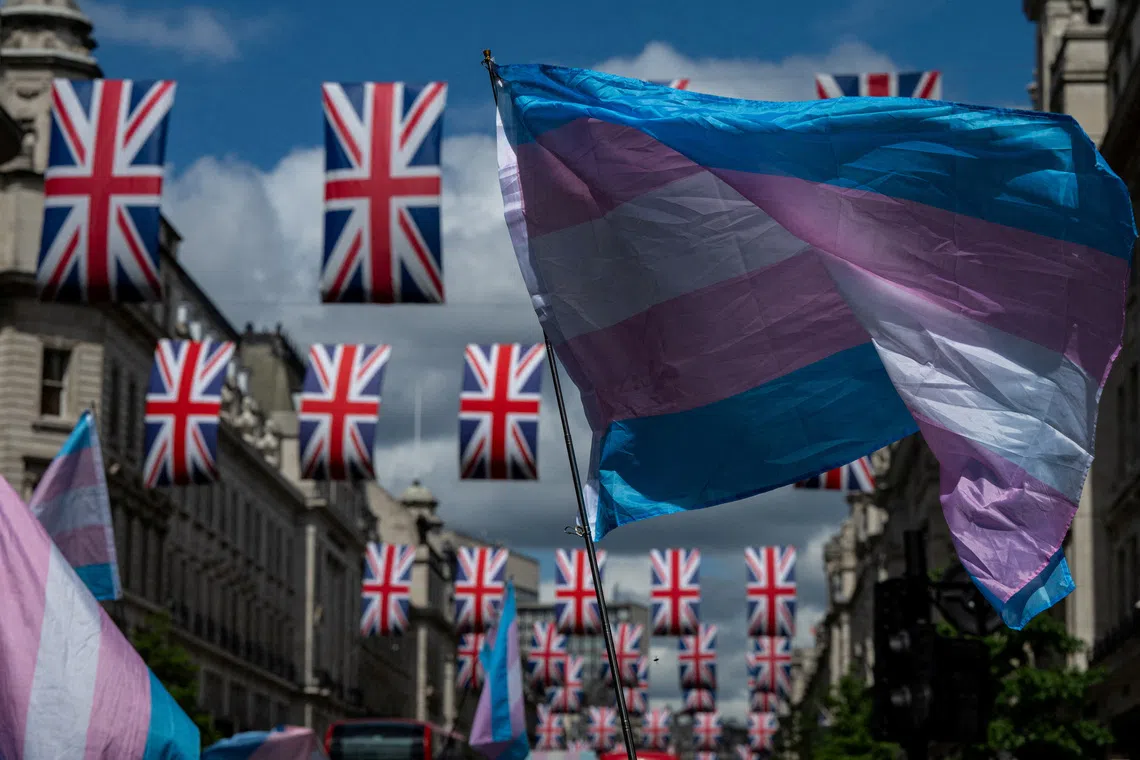 FILE PHOTO: Protesters from the STRIVE campaign march for trans rights along Regent Street following a Supreme Court ruling in April that only biological women are recognised under Britain's Equality Act, in London, Britain, May 25, 2025. REUTERS/Chris J. Ratcliffe/File Photo