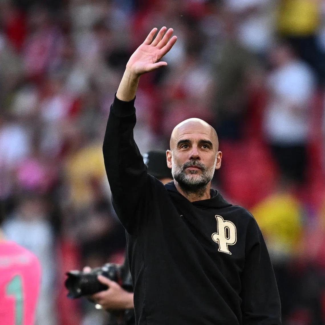 Soccer Football - FA Cup - Semi Final - Manchester City v Southampton - Wembley Stadium, London, Britain - April 25, 2026 Manchester City manager Pep Guardiola celebrates after the match REUTERS/Dylan Martinez