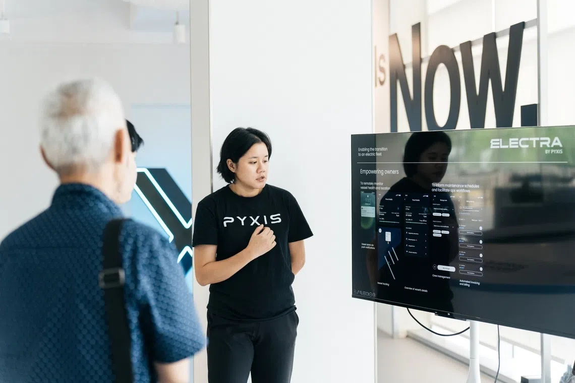 pyxis staff demonstrating how electra digital platform allows electric ferry operators to track vessel health, charging and fleet performance to make electrified fleets easier to run