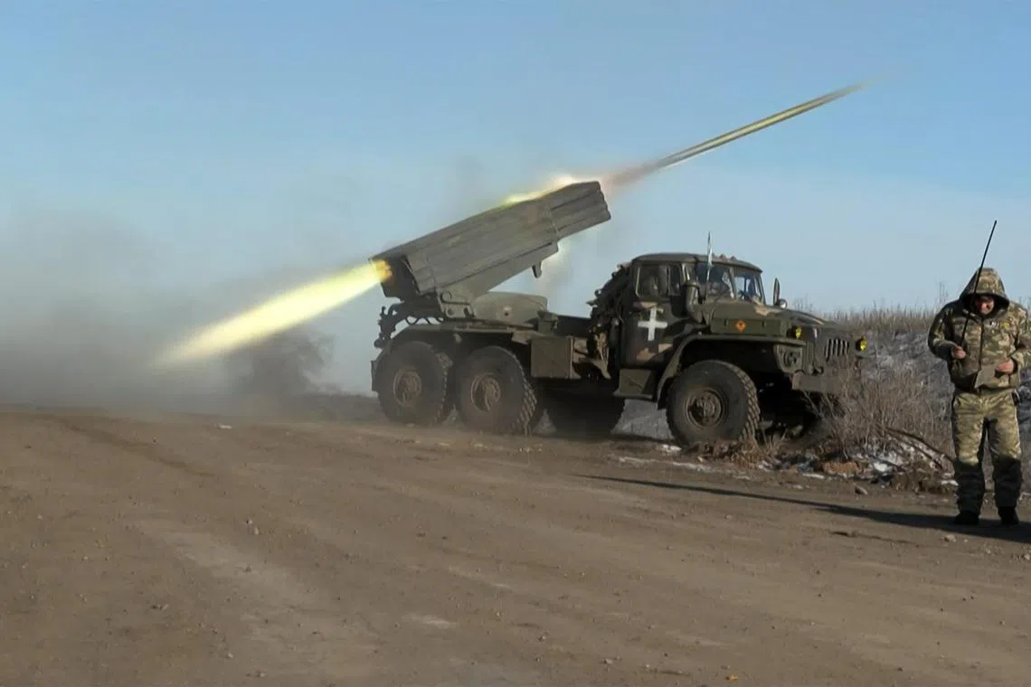 Ukraine's military fires a rocket launcher on the outskirts of Soledar on Jan 11.
