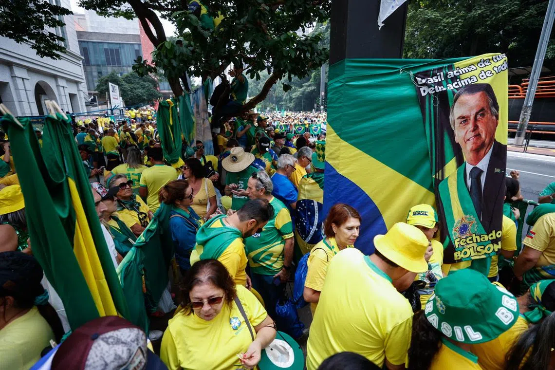 Supporters of Brazilian former President Jair Bolsonaro demonstrate at the Paulista Avenue in Sao Paulo.
