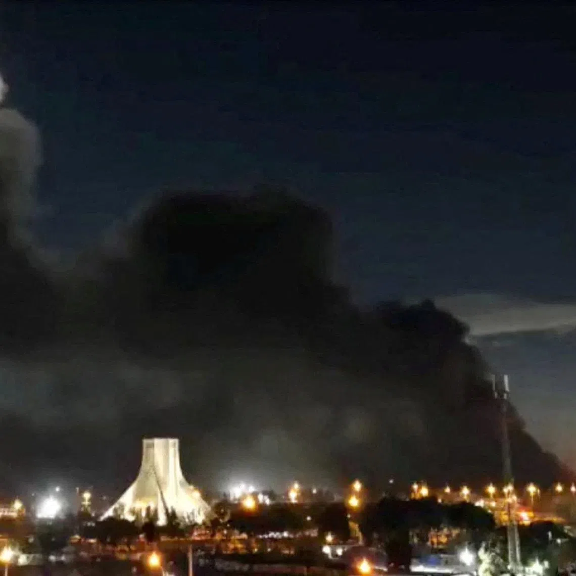 Smoke rises over Azadi Square following a strike, amid the U.S.-Israeli conflict with Iran, in Tehran, Iran, April 6, 2026, in this screengrab obtained from a social media video. Social Media via REUTERS