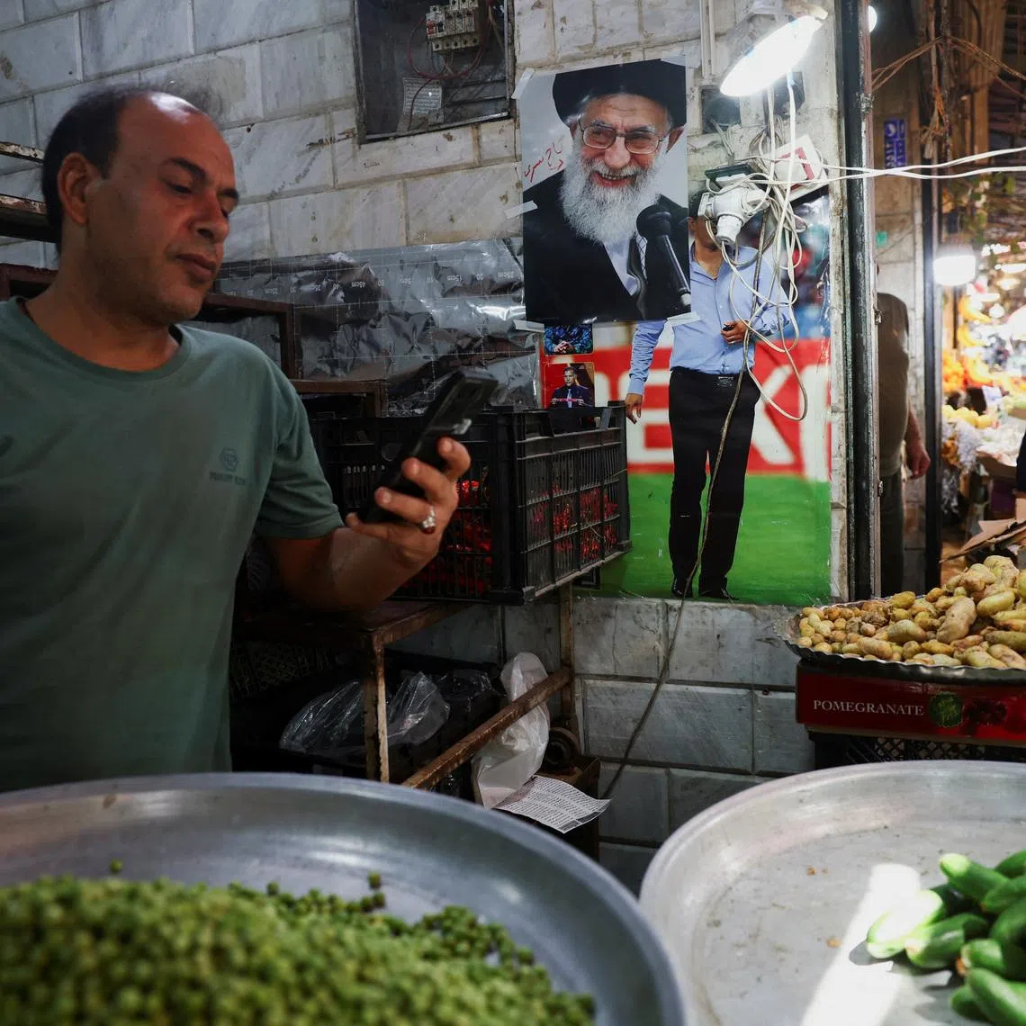 A picture of the late Iranian Supreme Leader Ayatollah Ali Khamenei at a store in a local market in Tehran, Iran, June 11, 2026. Majid Asgaripour/WANA (West Asia News Agency) via REUTERS