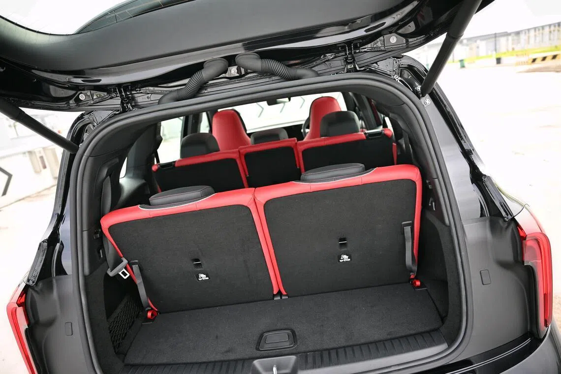 Limited boot space when the rearmost seats are in use is complemented by the sizeable storage under the bonnet.
