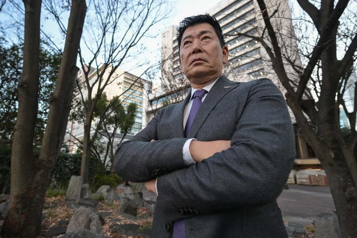 This photo taken on Jan 9 shows International Gymnastics Federation (FIG) chief Morinari Watanabe of Japan posing for a photo before an interview with AFP in central Tokyo. Watanabe is a rank outsider to become International Olympic Committee president but he hopes his "crazy idea" to host the Games in five cities at once can spark debate.