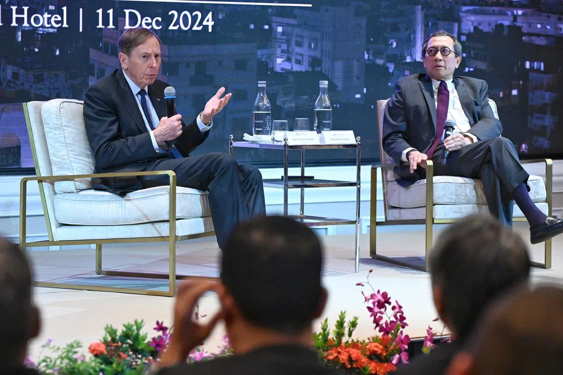 Former US general David Petraeus in conversation with Mr Bilahari Kausikan, Honorary Fellow at the Middle East Institute (MEI), during the MEI 2024 Roundup at the Orchard Hotel on Dec 11, 2024.