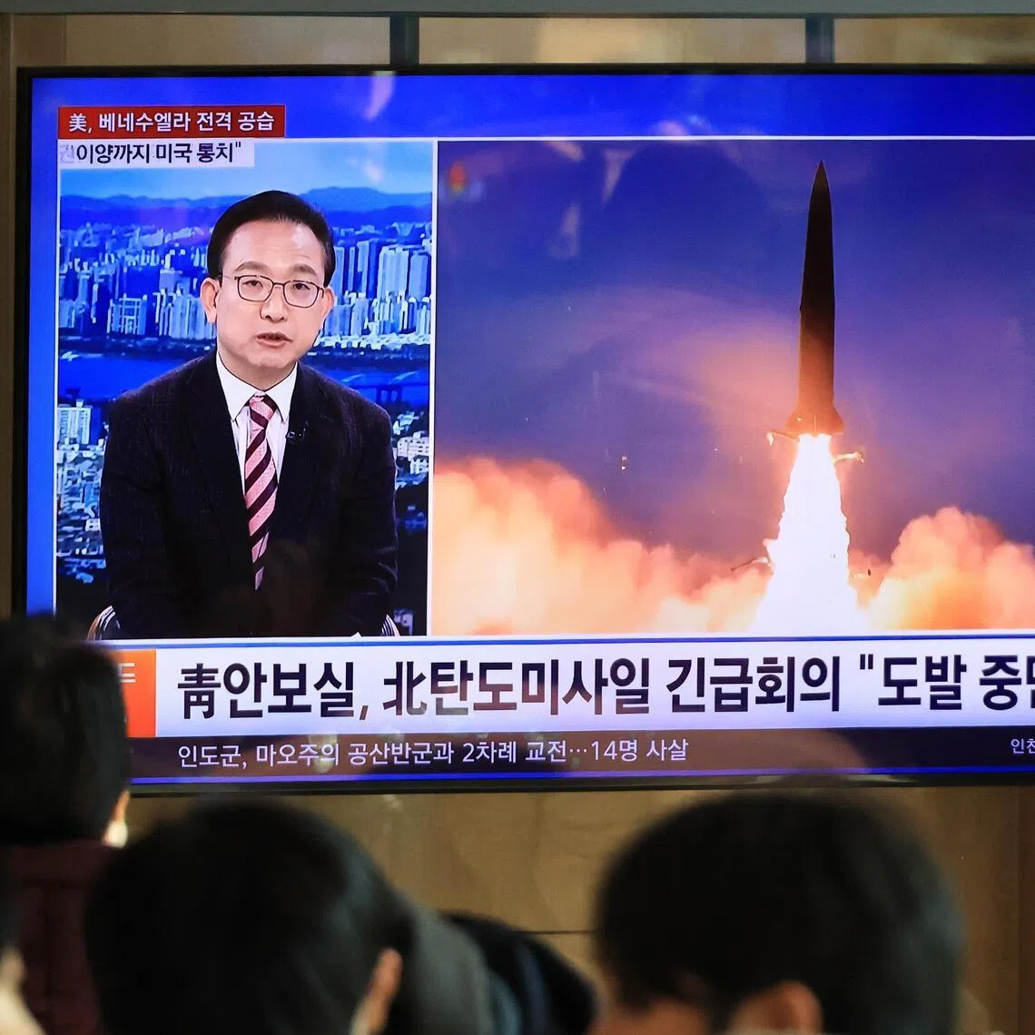 A crowd gathering at a waiting room in   Seoul Station watches the news about North Korea's launch of ballistic missiles for the first time this year in Jan 4, 2026. 