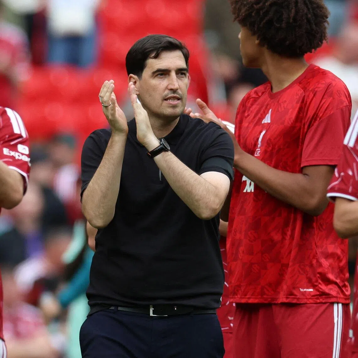 Liverpool’s new Spanish head coach Andoni Iraola and players applauding fans after their 3-2 loss to Monaco in a pre-season friendly at Anfield on Aug 9.