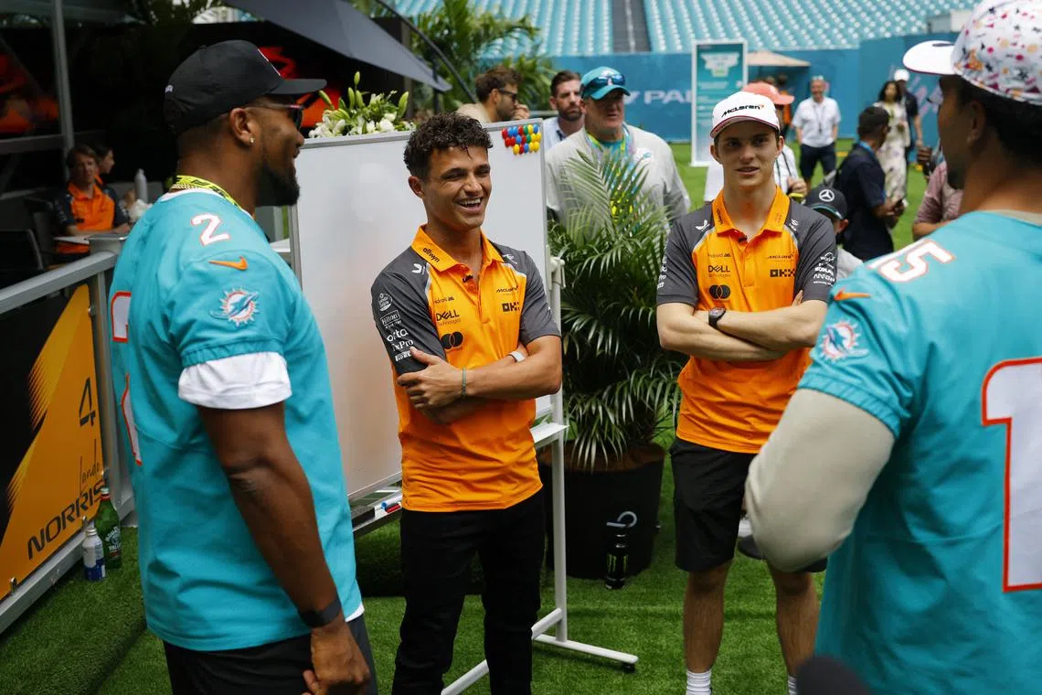 Formula One F1 - Miami Grand Prix - Miami International Autodrome, Miami, Florida, United States - May 1, 2025  McLaren's Lando Norris and McLaren's Oscar Piastri inside the Hard Rock Stadium ahead of the Miami Grand Prix REUTERS/Brian Snyder