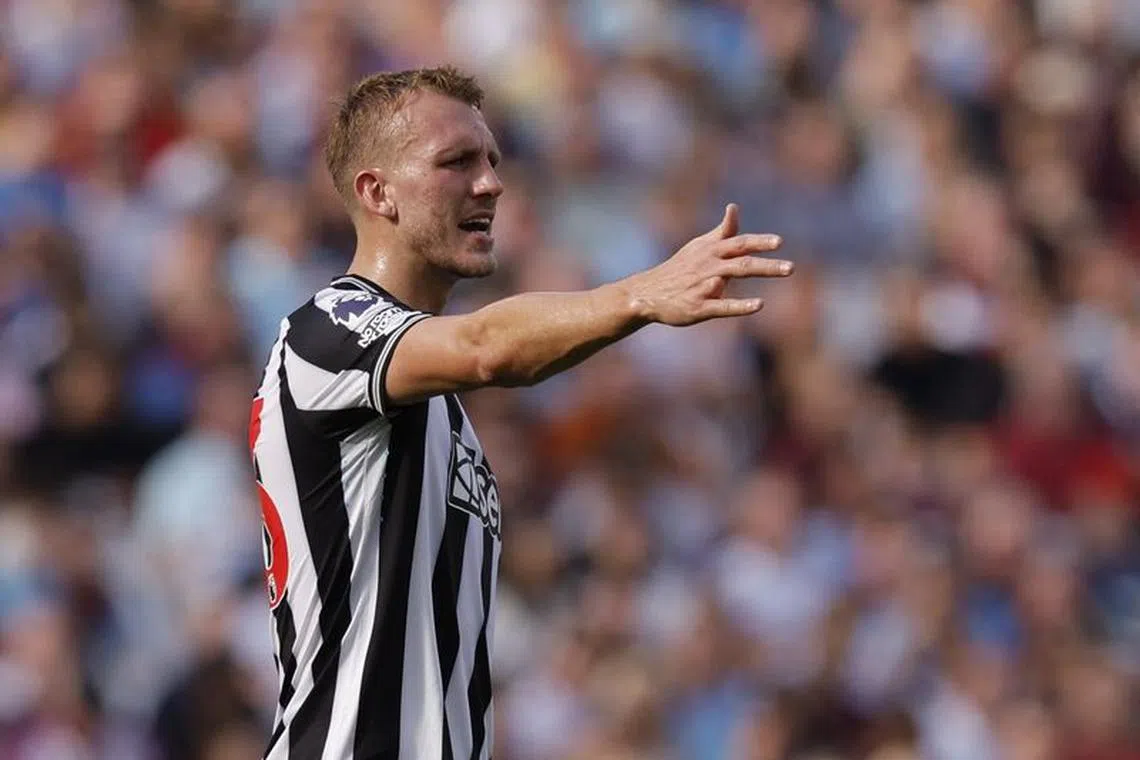 FILE PHOTO: Soccer Football - Premier League - West Ham United v Newcastle United - London Stadium, London, Britain - October 8, 2023 Newcastle United's Dan Burn reacts Action Images via Reuters/Andrew Couldridge/File Photo