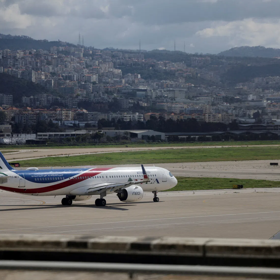 FILE PHOTO: A Lebanese Middle East Airlines (MEA) aircraft on the tarmac at Beirut-Rafic Hariri International Airport, following an escalation between Hezbollah and Israel, amid the U.S.-Israel conflict with Iran, in Beirut, Lebanon, March 4, 2026. REUTERS/Khalil Ashawi/File Photo
