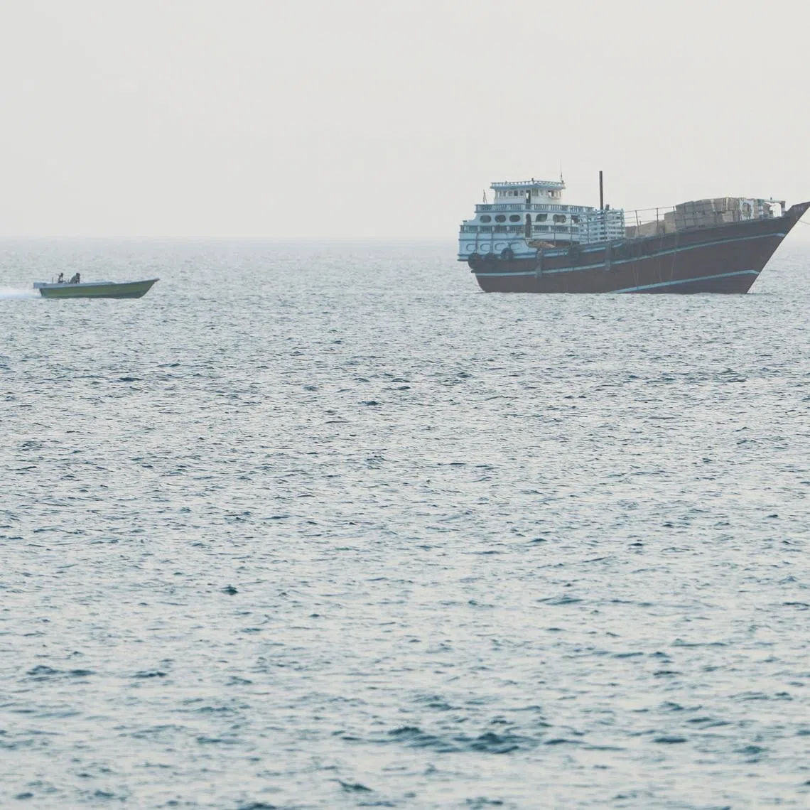 A vessel at the Strait of Hormuz, as seen from Musandam,Oman, July 15, 2026. REUTERS/Stringer
