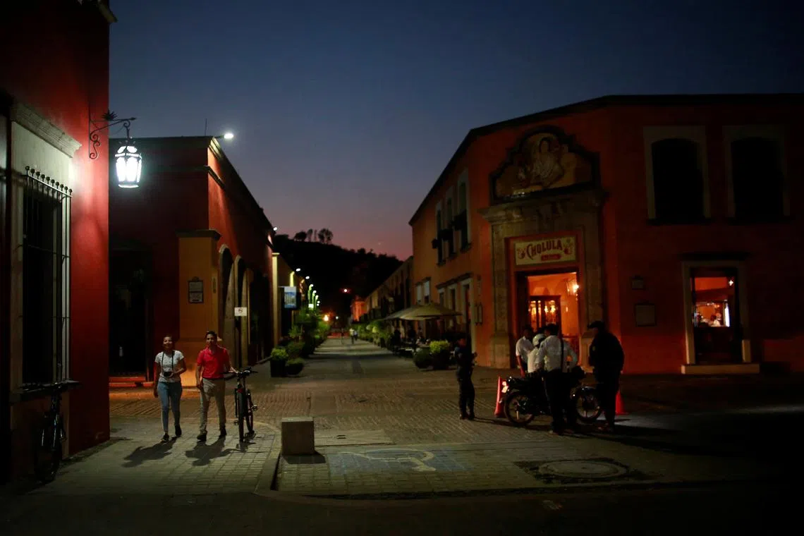 People walk around the town in Tequila, Jalisco, Mexico, April 10, 2018. REUTERS/Carlos Jasso