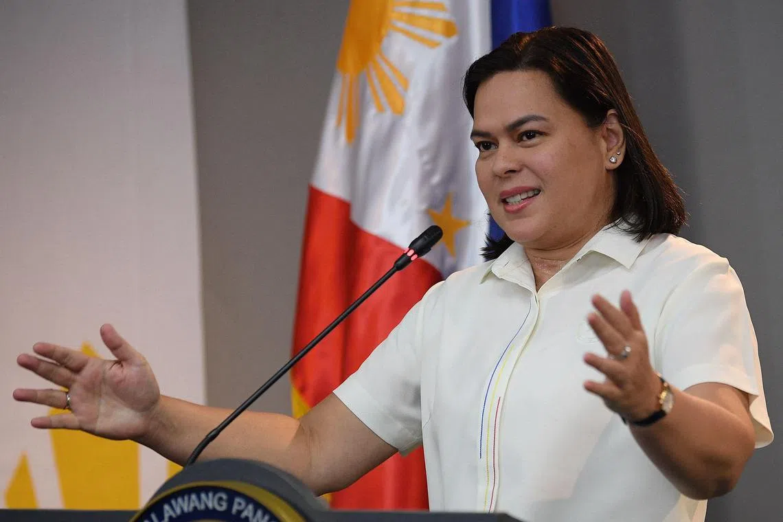 Philippine Vice-President Sara Duterte speaks during a press conference at her office in Manila on December 11, 2024. Hosting what she called a "thanksgiving" lunch for scores of journalists at her office instead of meeting with government investigators, Duterte accused the government of plotting to have her removed from office and charged in court. (Photo by TED ALJIBE / AFP)
