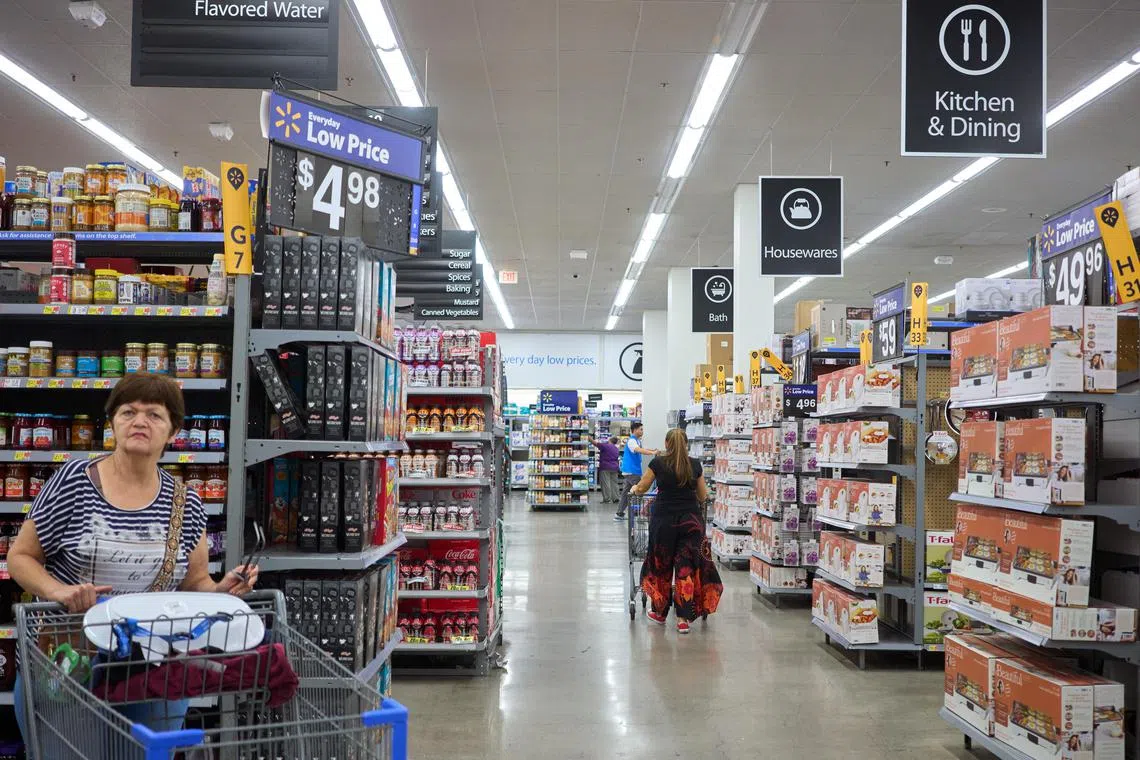 Consumers shop at Walmart in Los Angeles, California, USA, 17 September 2024. US retail sales unexpectedly rose by 0.1% in August. This release comes as investors expect the Federal Reserve will cut interest rates for the first time since 2020 on 18 September 2024.  EPA-EFE/ALLISON DINNER