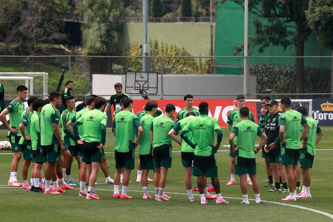 Soccer Football - FIFA World Cup 2026 - Mexico Training - Centro de Alto Rendimiento, Mexico City, Mexico - June 6, 2026 Mexico coach Javier Aguirre and assistant coach Rafael Marquez with players during training REUTERS/Henry Romero
