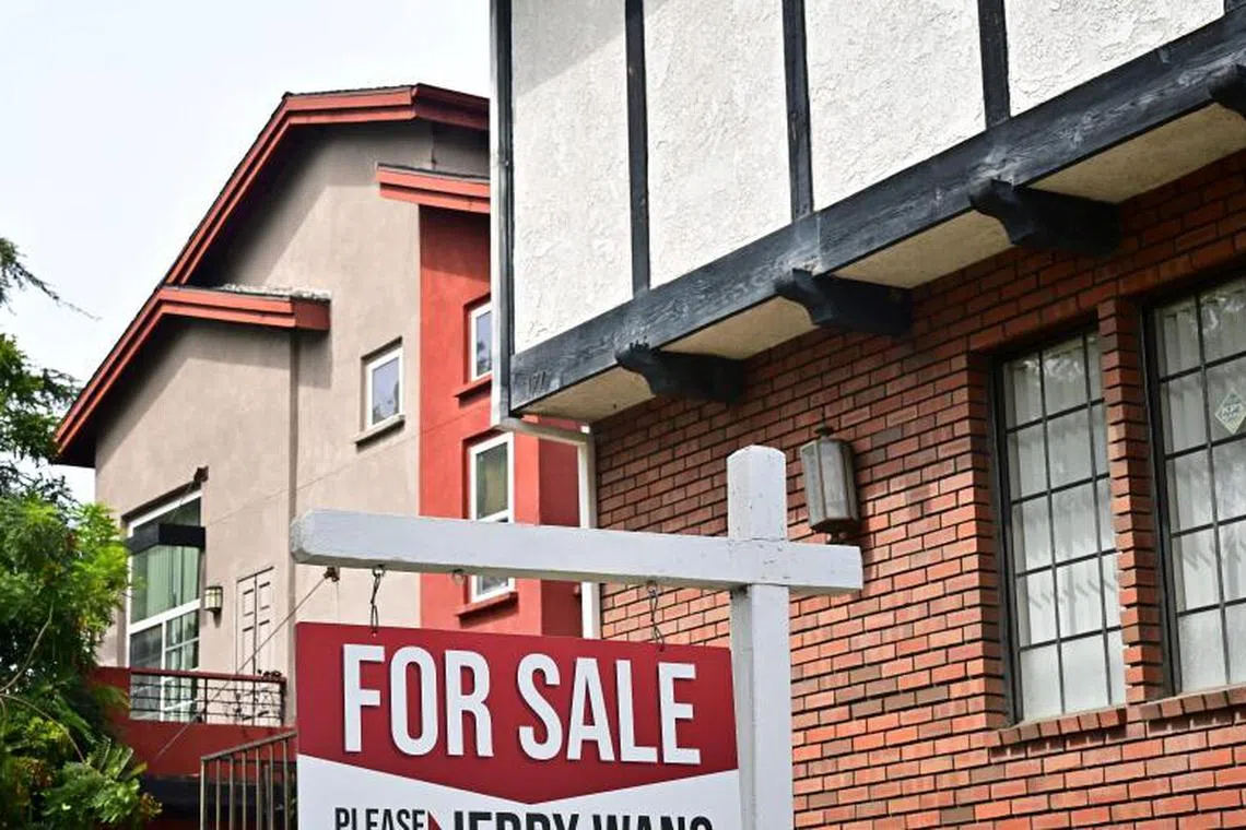 A 'For Sale' sign posted beside property for sale in Alhambra, California, on Aug 28, 2025.
