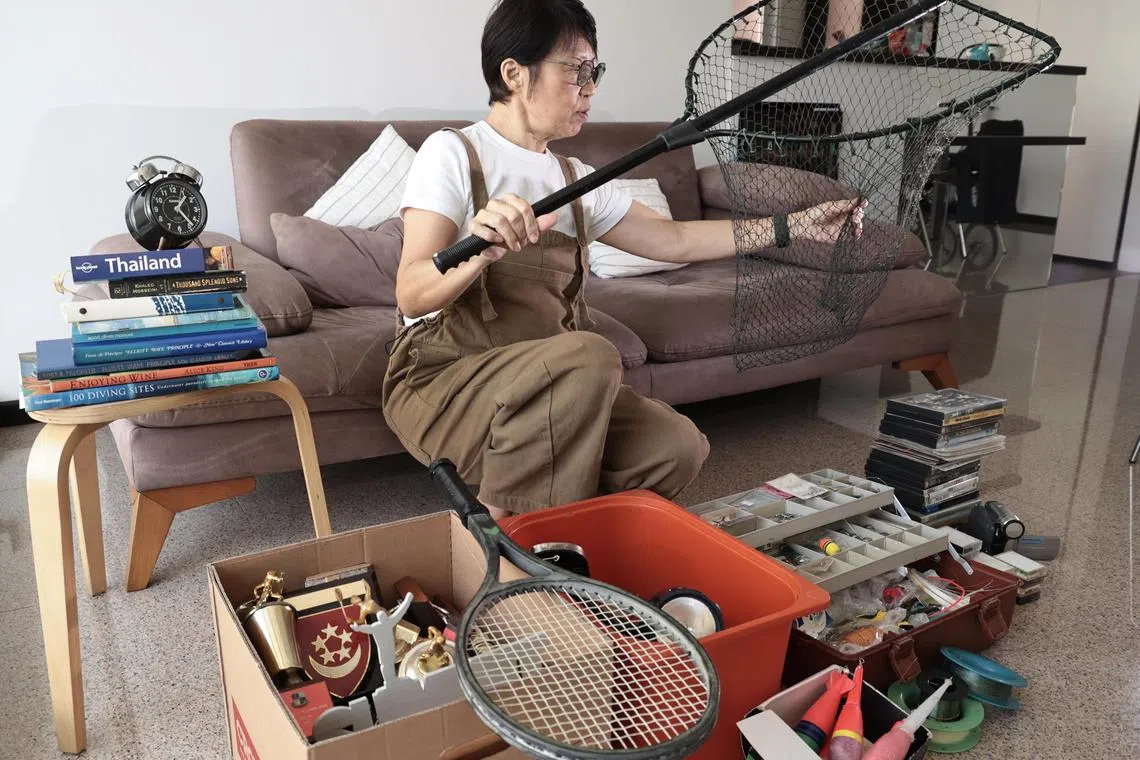 Ms Margaret Ong, 61 , keeps an old fishing net her husband bought for her decades ago, even though she no longer uses it. It is hard to let go of items with sentimental associations, she says.