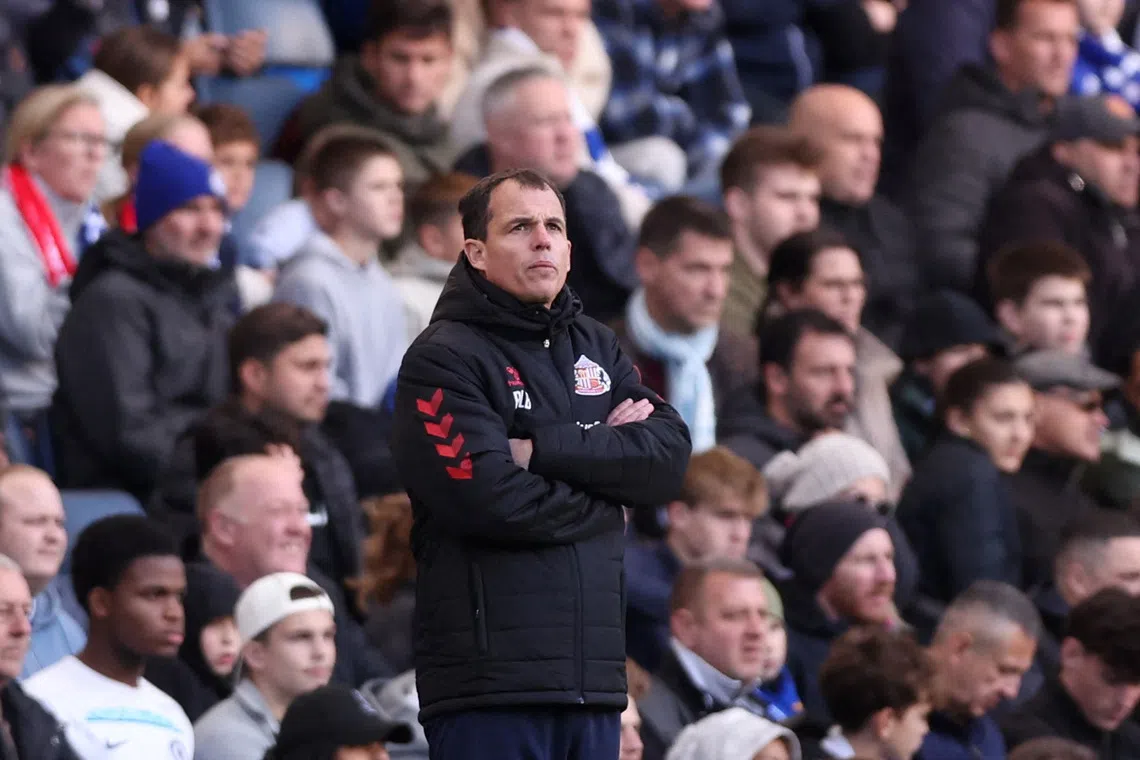 Soccer Football - Premier League - Chelsea v Sunderland - Stamford Bridge, London, Britain - October 25, 2025 Sunderland manager Regis Le Bris looks on REUTERS/David Klein