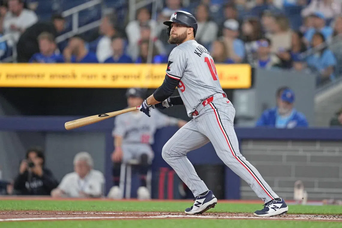 FILE PHOTO: May 11, 2024; Toronto, Ontario, CAN; Minnesota Twins left fielder Alex Kirilloff (19) hits two run triple against the Toronto Blue Jays during the first inning at Rogers Centre. Mandatory Credit: Nick Turchiaro-USA TODAY Sports/File Photo