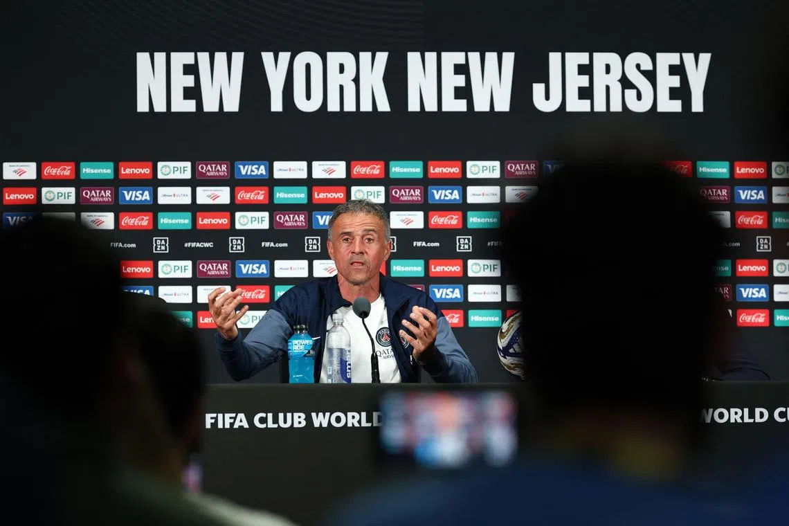 PSG coach Luis Enrique speaking at a press conference ahead of the Club World Cup final against Chelsea.