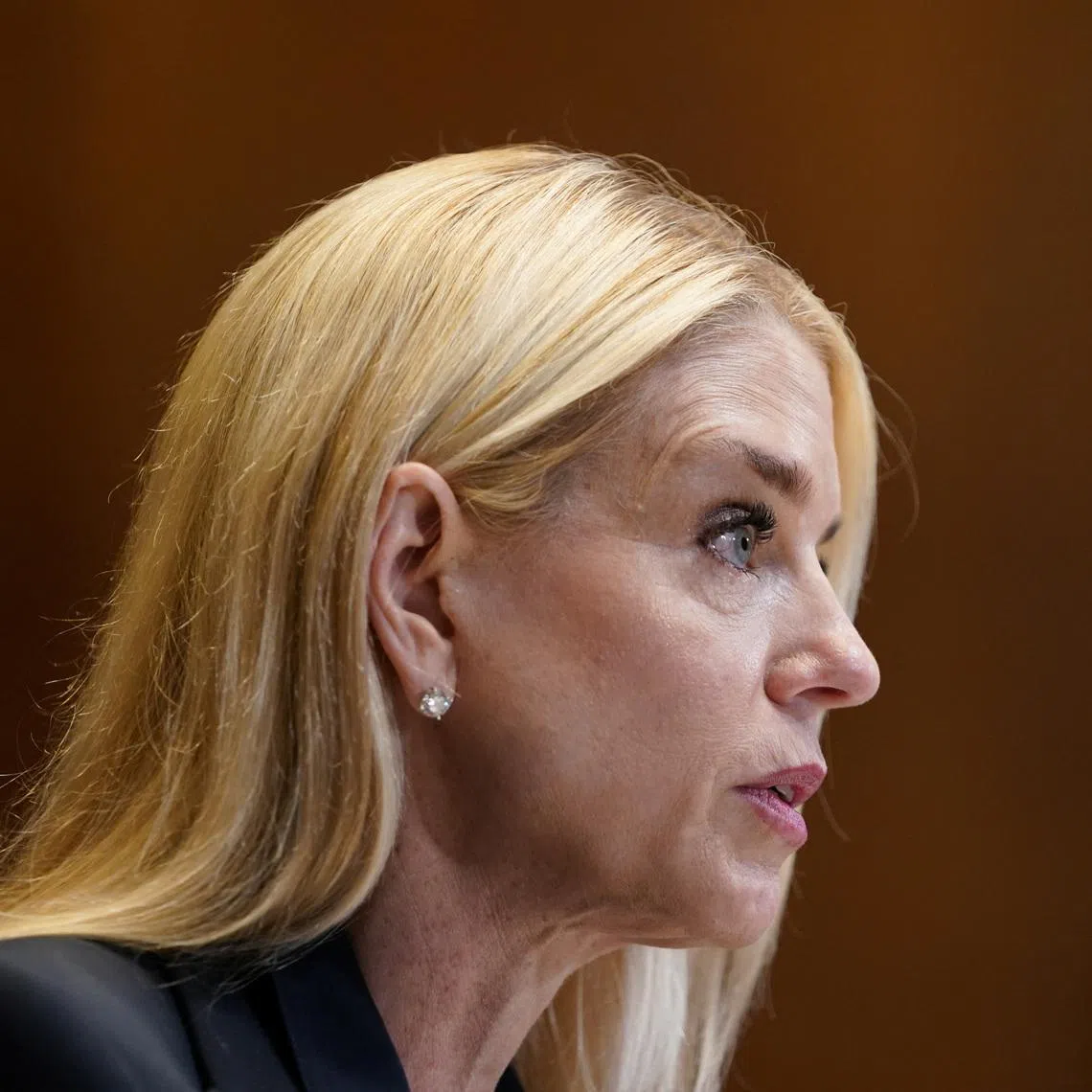 FILE PHOTO: U.S. Attorney General Pam Bondi testifies before a Senate Appropriations Subcommittee hearing on U.S. President Donald Trump's budget request for the Department of Justice, on Capitol Hill in Washington, D.C., U.S., June 25, 2025. REUTERS/Nathan Howard/File Photo