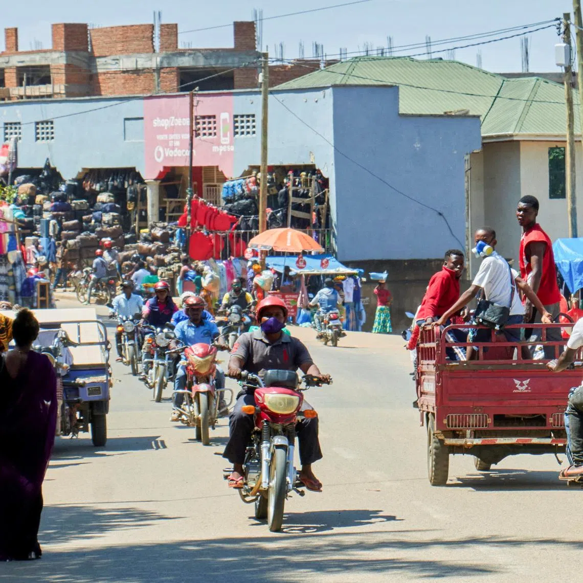Motorcycle taxis ride along a street, as aid agencies intensify efforts to contain a new Ebola outbreak involving the Bundibugyo strain, in Bunia, Ituri province, Democratic Republic of Congo, May 22, 2026. REUTERS/Gradel Muyisa Mumbere
