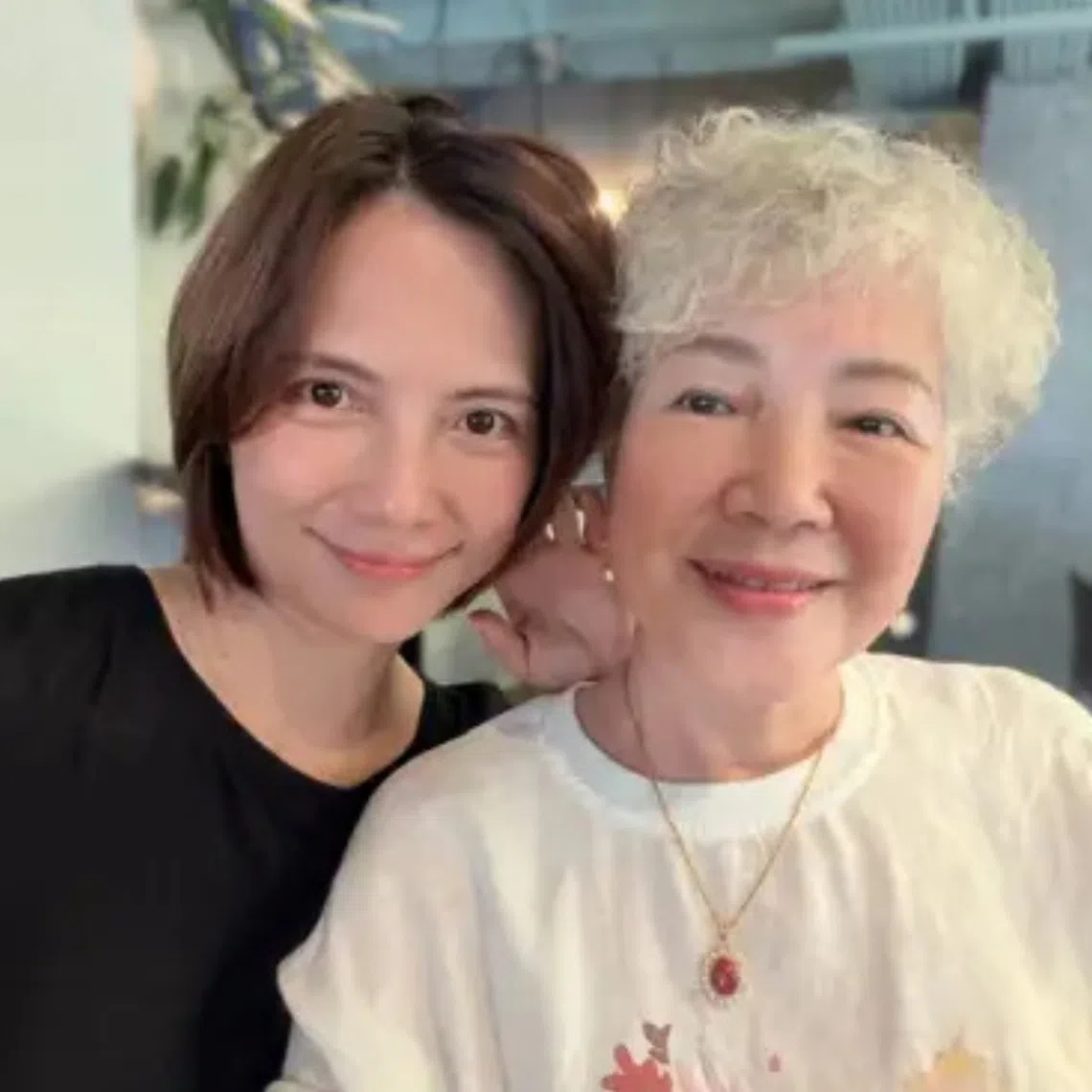 On Oct 19, the 50-year-old took to social media to share a rare photo with her mother, who looked radiant despite her full head of white hair.