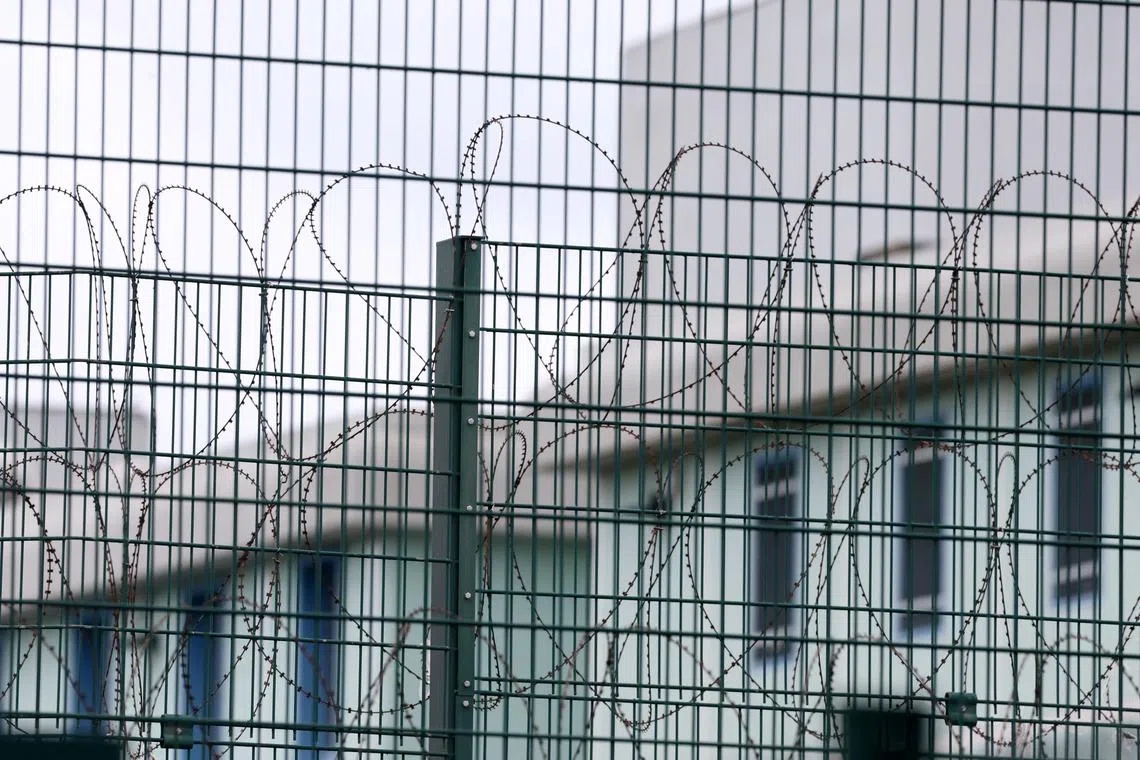 Barbed wire fence at the Tarascon prison near Avignon, France, April 16, 2025. REUTERS/Manon Cruz