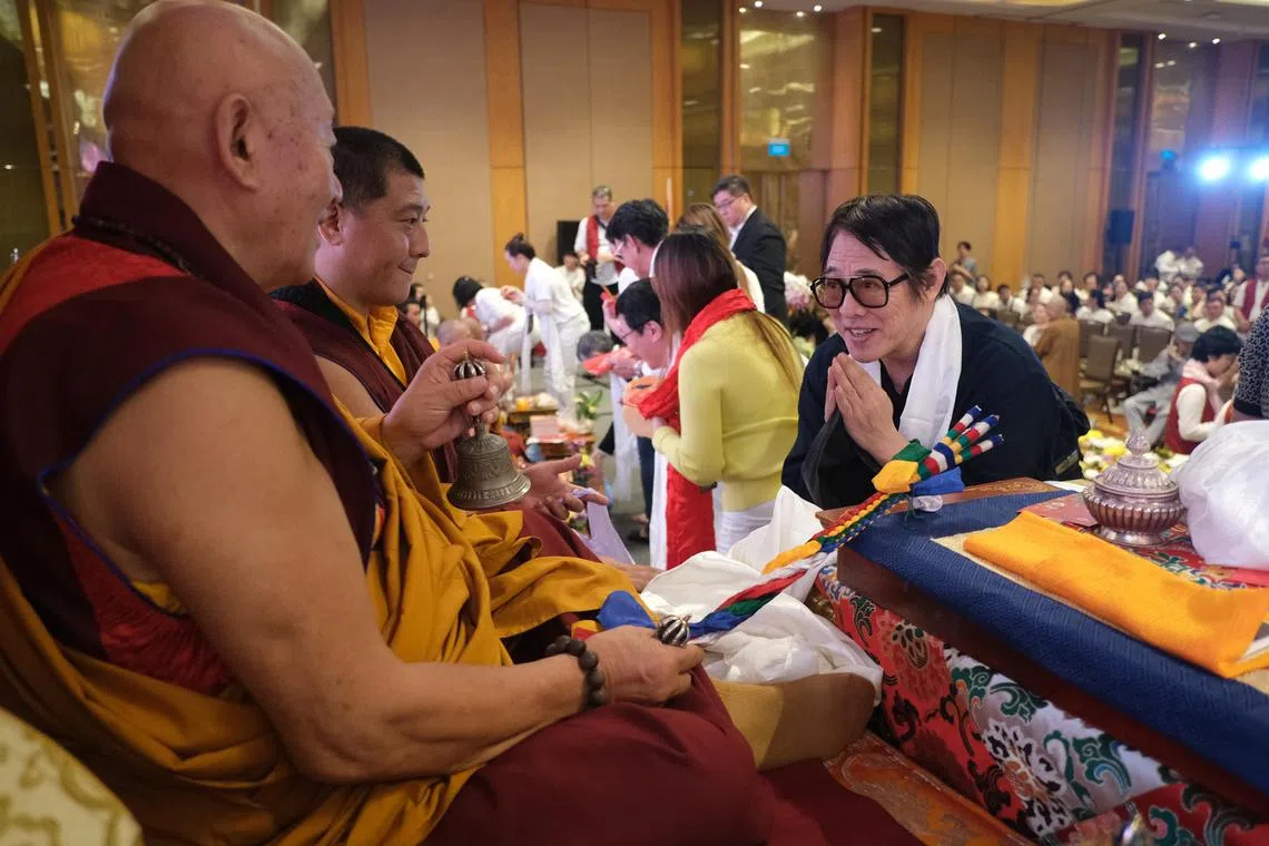 Jet Li (in black) at a Buddhist event in Singapore