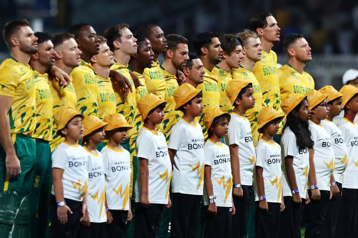 Cricket - ICC Men's T20 World Cup 2026 - Semi Final - South Africa v New Zealand - Eden Gardens, Kolkata, India - March 4, 2026 South Africa players line up during the national anthems before the match REUTERS/Anushree Fadnavis