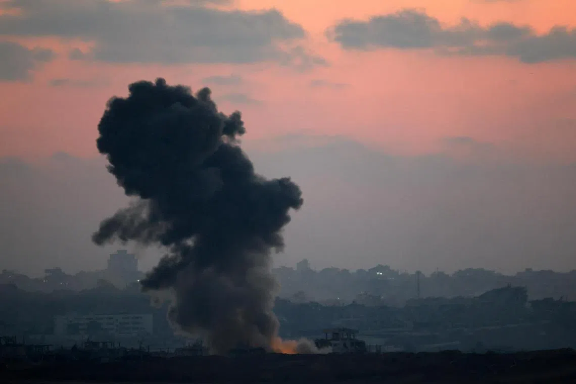 Smoke rises following an explosion in Gaza, as seen from the Israeli side of the Israel-Gaza border, on July 9.