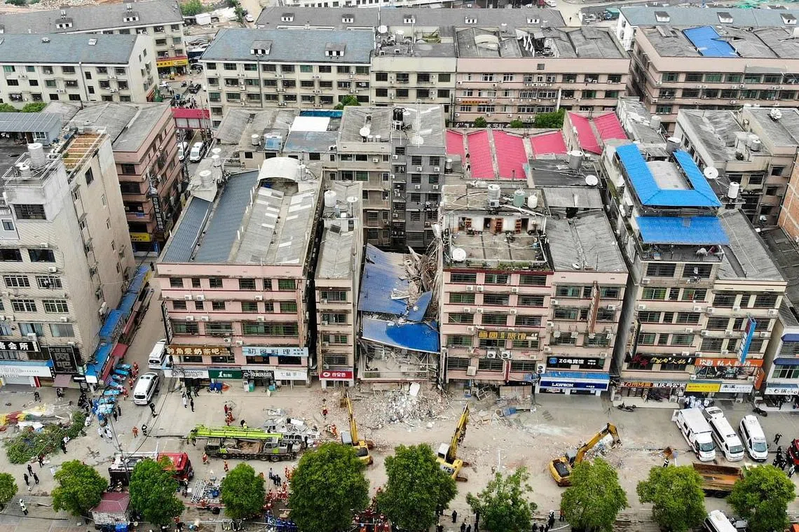 Rescuers working after a six-storey building collapsed in Changsha, in China's central Hunan province, on April 29, 2022.