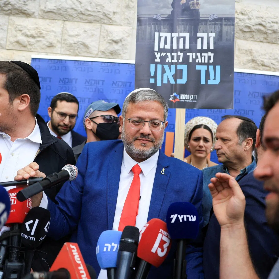 FILE PHOTO: Israeli National Security Minister Itamar Ben-Gvir speaks to members of the media on the day the Supreme Court hears a petition seeking to force Prime Minister Benjamin Netanyahu to remove him, in Jerusalem, April 15, 2026. REUTERS/Ronen Zvulun/File Photo