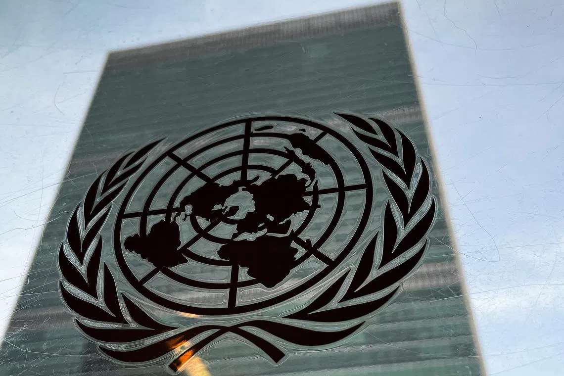 FILE PHOTO: The United Nations headquarters building is pictured with a UN logo in the Manhattan borough of New York City, New York, U.S., March 1, 2022.  REUTERS/Carlo Allegri/File Photo