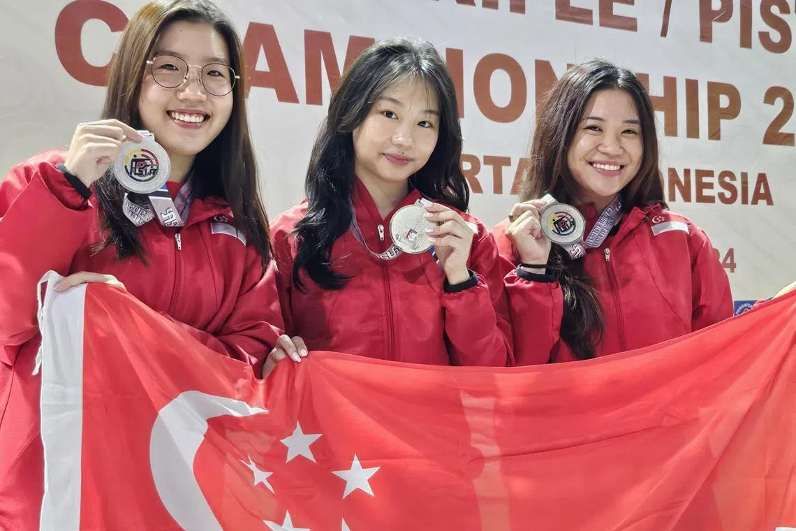 The trio of (from left) Fernel Tan, Natanya Tan and Martina Veloso clinched a silver at the Asian Rifle/Pistol Championship at the Senayan Shooting Range on Jan 10.