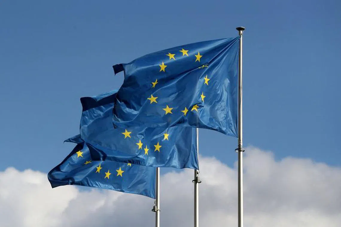 FILE PHOTO: European Union flags fly outside the EU Commission headquarters in Brussels, Belgium September 19, 2019. REUTERS/Yves Herman/File Photo