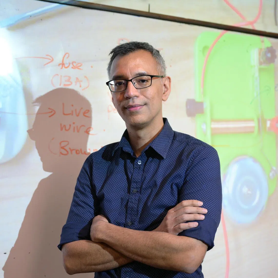 Science teacher Syed Ali Mohamed Alhabshee has significant hearing loss.