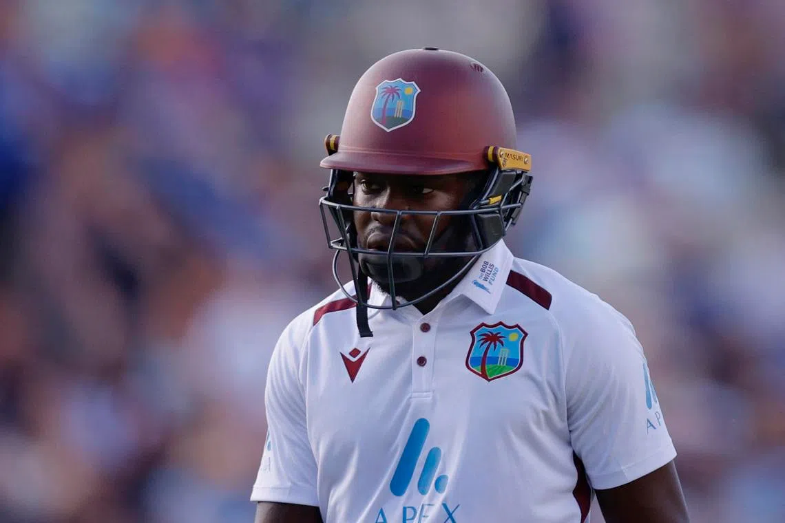 Cricket - Third Test - England v West Indies - Edgbaston Cricket Ground, Birmingham, Britain - July 27, 2024 West Indies' Kirk McKenzie walks back to the pavilion after losing his wicket, caught out by England's Jamie Smith off the bowling of Gus Atkinson Action Images via Reuters/Andrew Couldridge