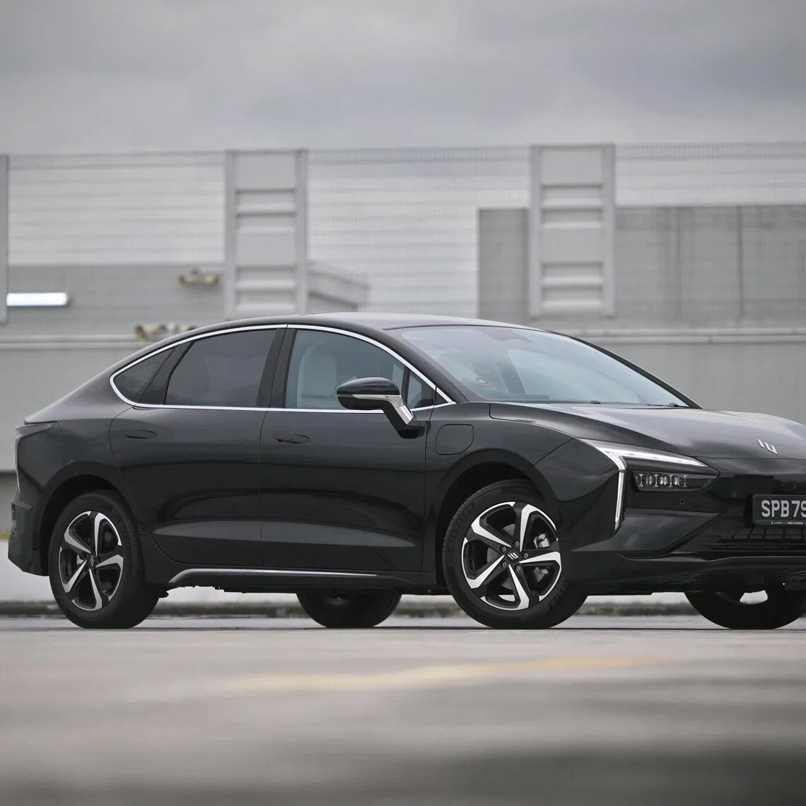 Interior and exterior of the JMEV Elight electric sedan, on Sep 30, 2025.