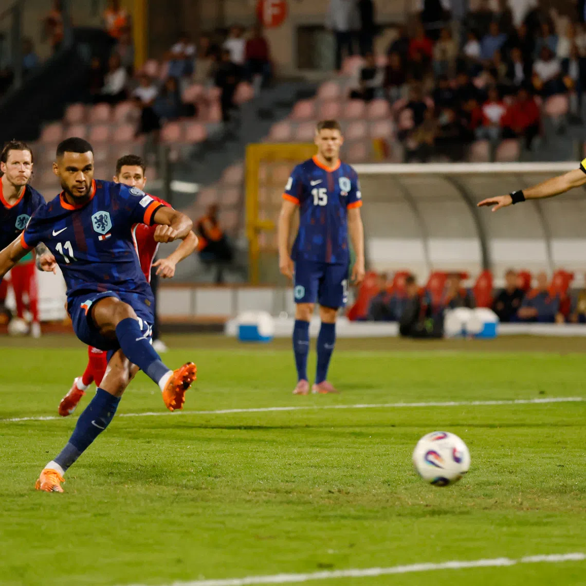 Soccer Football - FIFA World Cup - UEFA Qualifiers - Group G - Malta v Netherlands - National Stadium Ta' Qali, Attard, Malta - October 9, 2025 Netherlands' Cody Gakpo scores their second goal from the penalty spot REUTERS/Darrin Zammit Lupi