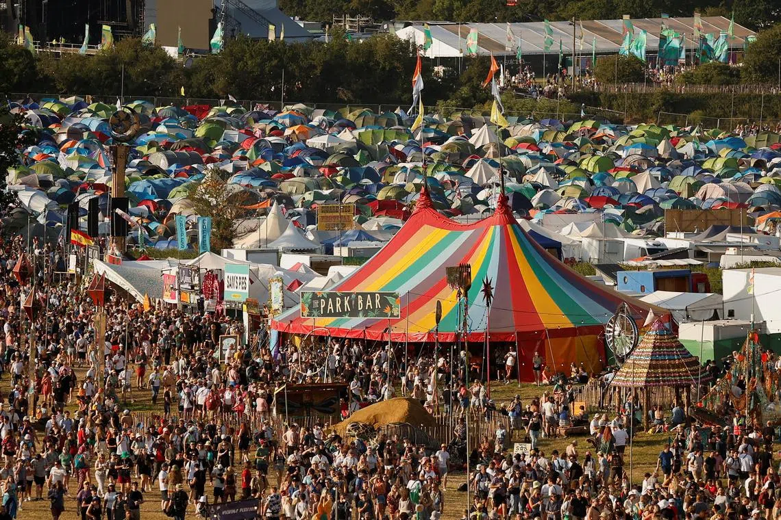 Music fans gathering at the Glastonbury Festival site in Somerset, Britain, on Wednesday. 