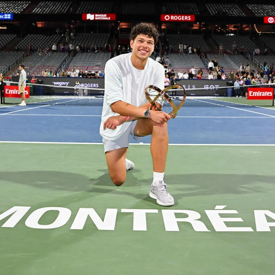 Ben Shelton of the United States posing with the trophy after his victory over compatriot Brandon Nakashima in the men’s singles final at the ATP 1000 National Bank Open on Aug 13 in Montreal, Canada.