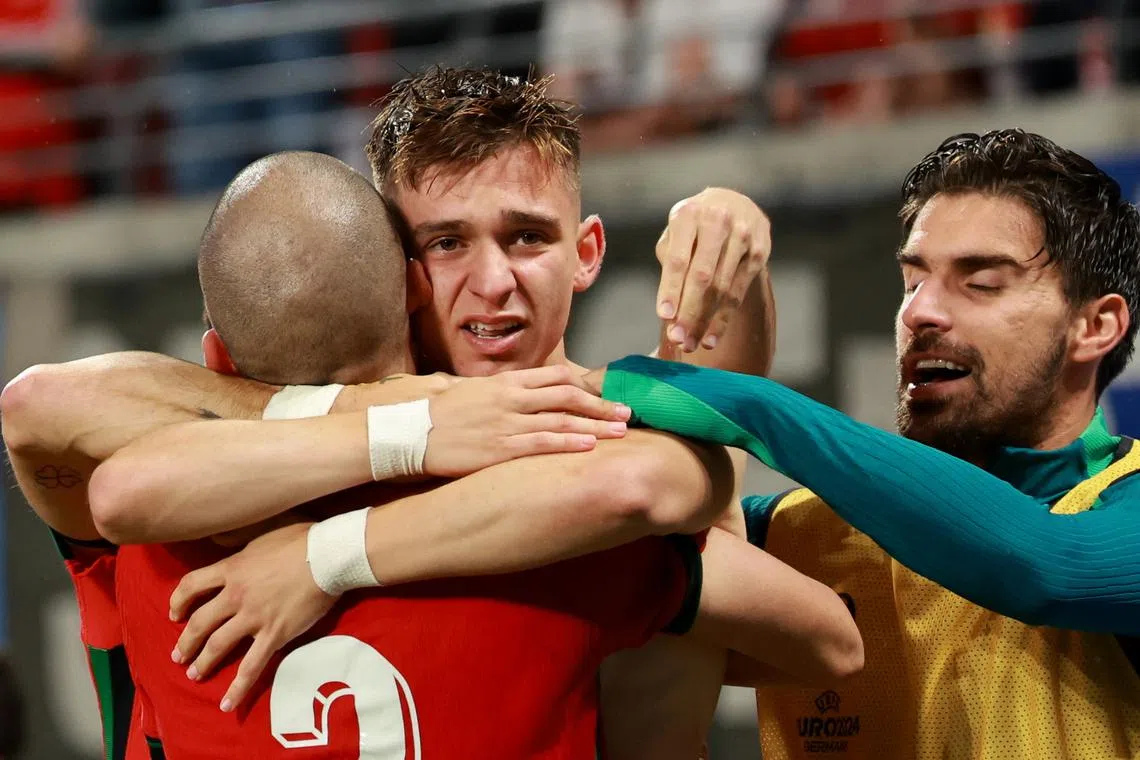 Francisco Conceicao (centre) celebrates scoring the 2-1 lead during the match between Portugal and Czech Republic, on June 18.