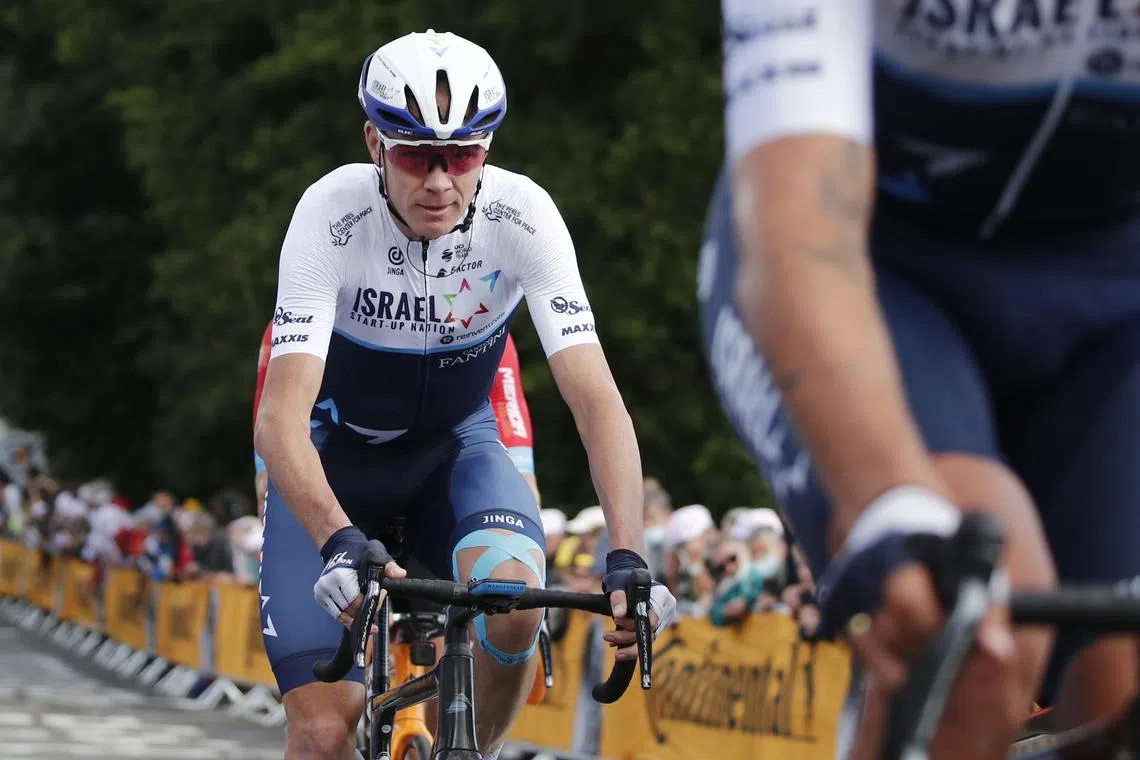 FILE PHOTO: Cycling - Tour de France - Stage 2 - Perros-Guirec to Mur-de-Bretagne Guerledan - France - June 27, 2021 Israel Start-Up Nation rider Chris Froome of Britain crosses the line after the second stage REUTERS/Benoit Tessier/File Photo