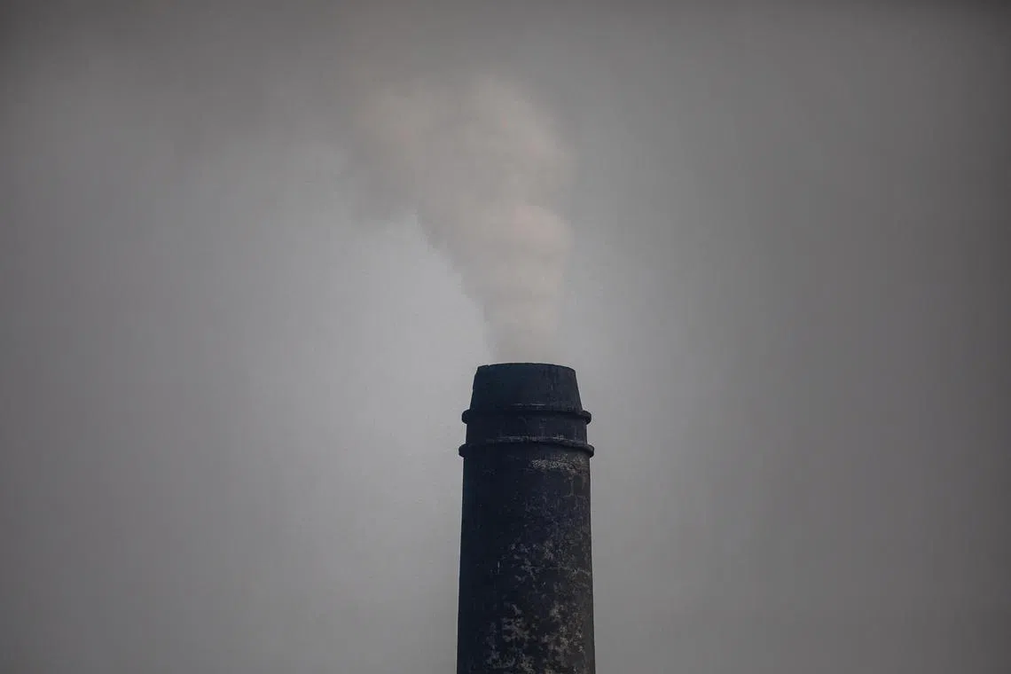 epa10922874 Smoke billows from a chimney of a brick factory in Keraniganj, Dhaka, Bangladesh, 17 October 2023. Dhaka remains one of the most polluted cities globally, with construction debris, industrial pollution, vehicle emissions, and brick kilns identified as significant contributors to air pollution. The Air Quality Life Index (AQLI) rates Bangladesh as one of the most polluted countries in the world.  EPA-EFE/MONIRUL ALAM