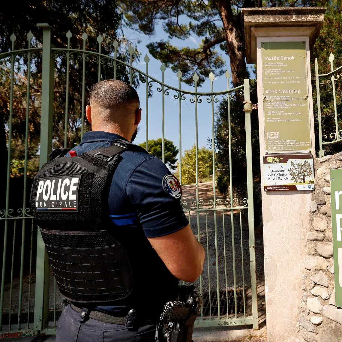 A French police officer stands in front of the entrance of the Renoir Museum in Cagnes-sur-Mer, south of France, on Sept 8.