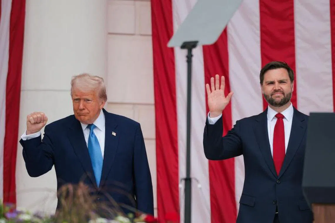 ARLINGTON, VIRGINIA - MAY 26: U.S. President Donald Trump (L) and U.S. Vice President JD Vance greet visitors during the Memorial Day wreath-laying ceremony at the Memorial Amphitheater in Arlington National Cemetery on May 26, 2025 in Arlington, Virginia. Memorial Day is observed on the last Monday in May each year to honor and mourn U.S. military personnel who died while serving in the United States Armed Forces. Kayla Bartkowski/Getty Images/AFP (Photo by Kayla Bartkowski / GETTY IMAGES NORTH AMERICA / Getty Images via AFP)