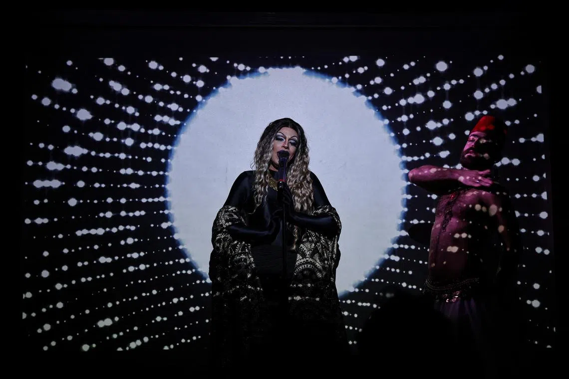 Israeli drag queen who uses the name Judy LaDivina, 39, and 27-year-old Syrian dancer and activist, who uses the stage name 'The Darvish', perform on stage in their show 'Together', which they describe as "cultivating a prosperous connection and Arabic-Jewish harmony" at the Tipsy Bear bar in Berlin, Germany, March 11, 2024.   REUTERS/Omer Messinger     TPX IMAGES OF THE DAY     THIS PHOTO ONLY TO BE PUBLISHED TO ILLUSTRATE THE STORY SLUGGED ISRAEL-PALESTINIANS/GERMANY-SHOW